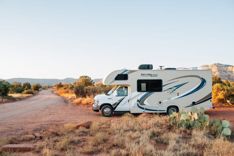 an RV vehicle parked in the desert